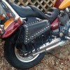 Motorcycle black leather saddlebags with studs and tassels (11L)